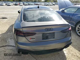 2022 Audi RS 5 Sportback z VIN WUAAWCF57NA901250, wystawiony jako Copart lot #77305584 z przebiegiem Nie podano mil oraz Nie do naprawy. Historia ofert i sprzedaży dostępna na DreamBid. Obrazek 6.