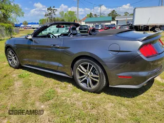 2015 Ford Mustang EcoBoost Premium with VIN 1FATP8UH5F5383331, listed as a IAAI auction lot 42032039 with 69,960 mi miles and . Bid and sale history available at carsss.com. Image 3.