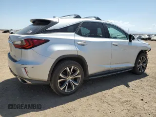 2016 Lexus RX 350 with VIN 2T2ZZMCA8GC016032, listed as a Copart auction lot 58400605 with 142,878 mi miles and Salvage title. Bid and sale history available at DreamBid. Image 3.