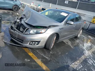 2015 Kia Optima SX Turbo with VIN 5XXGR4A69FG474261, listed as a IAAI auction lot 41103677 with 119,988 mi miles. Bid and sale history available at carsss.com. Image 17.