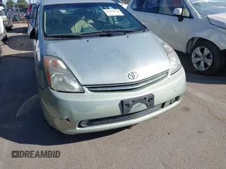 2007 Toyota Prius z VIN JTDKB20U973221624, wystawiony jako IAAI lot #42484947 z przebiegiem 257 311 mil mil oraz . Historia ofert i sprzedaży dostępna na DreamBid. Obrazek 16.