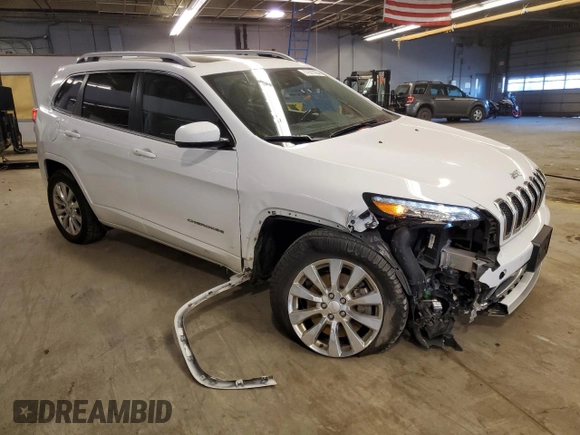 2018 Jeep Cherokee Overland with VIN 1C4PJMJX5JD558242, listed as a Copart auction lot 77577254 with 55,440 mi miles and Salvage Title. Bid and sale history available at carsss.com. Image 4.