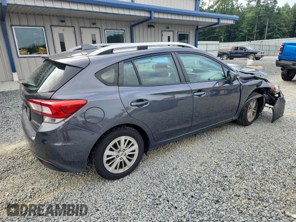 2018 Subaru Impreza Premium with VIN 4S3GTAD64J3715454, listed as a Copart auction lot 64798345 with 63,467 mi miles and Salvage title. Bid and sale history available at DreamBid. Image 3.