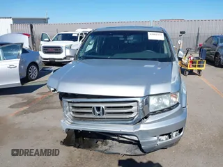 2012 Honda Ridgeline RTL with VIN 5FPYK1F56CB457687, listed as a IAAI auction lot 42582331 with 96,357 mi miles and . Bid and sale history available at DreamBid. Image 12.
