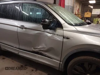 2020 Volkswagen Tiguan SE with VIN 3VV2B7AX5LM149305, listed as a IAAI auction lot 41920685 with 30,512 mi miles and . Bid and sale history available at DreamBid. Image 6.