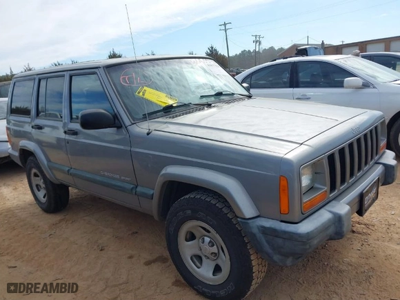 2000 Jeep Cherokee Police with VIN 1J4FT48S6YL142159, listed as a IAAI auction lot 41677328 with 107,154 mi miles. Bid and sale history available at carsss.com. Image 13.