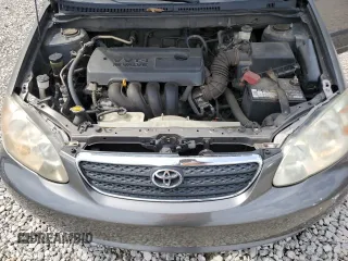 2006 Toyota Corolla CE z VIN 1NXBR32E46Z702893, wystawiony jako Copart lot #55446655 z przebiegiem 269 124 mil mil oraz Szkoda całkowita • Salvage title. Historia ofert i sprzedaży dostępna na DreamBid. Obrazek 11.
