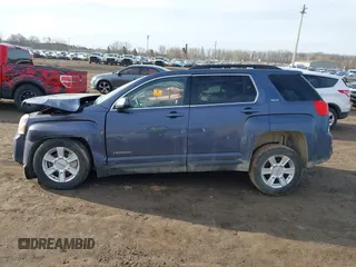 2013 GMC Terrain SLE z VIN 2GKALSEKXD6312913, wystawiony jako IAAI lot #41787328 z przebiegiem 153 646 mil mil oraz . Historia ofert i sprzedaży dostępna na DreamBid. Obrazek 14.