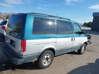 1994 Chevrolet Astro with VIN 1GNEL19W5RB123229, listed as a IAAI auction lot 41675096 with 186,497 mi miles. Bid and sale history available at carsss.com. Image 4.