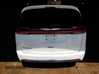2023 Chrysler Pacifica Touring L z VIN 2C4RC1BG2PR532932, wystawiony jako Copart lot #62172575 z przebiegiem 67 521 mil mil oraz Czysty tytuł • Clean title. Historia ofert i sprzedaży dostępna na DreamBid. Obrazek 6.