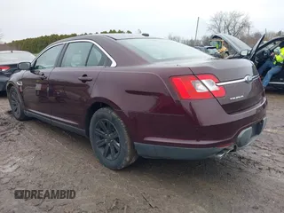 2011 Ford Taurus SE with VIN 1FAHP2DW7BG136988, listed as a IAAI auction lot 42002512 with 145,847 mi miles. Bid and sale history available at carsss.com. Image 3.