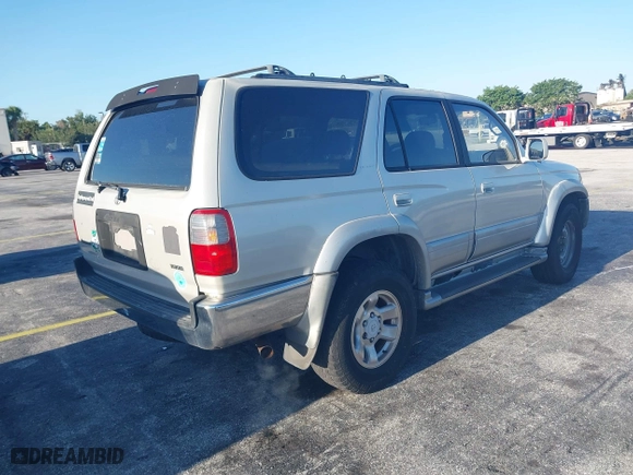1997 Toyota 4Runner Limited with VIN JT3GN87R3V0043679, listed as a IAAI auction lot 42043029 with 296,834 mi miles. Bid and sale history available at carsss.com. Image 4.