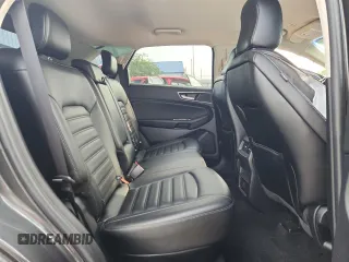 2020 Ford Edge SEL с VIN 2FMPK4J97LBA71577, выставлен на аукционе Copart как лот 60028525 с пробегом 66 365 миль миль и Списание • Salvage title. История ставок и продаж доступна на DreamBid. Изображение 11.