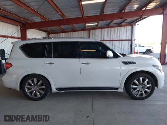 2012 Infiniti QX56 8-passenger with VIN JN8AZ2ND0C9715396, listed as a IAAI auction lot 41267602 with 206,630 mi miles and . Bid and sale history available at DreamBid. Image 14.