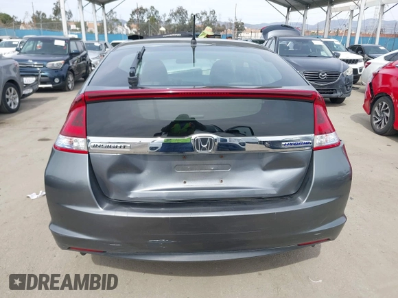 2012 Honda Insight EX z VIN JHMZE2H73CS000751, wystawiony jako IAAI lot #41687288 z przebiegiem 181 593 mil mil oraz . Historia ofert i sprzedaży dostępna na DreamBid. Obrazek 16.