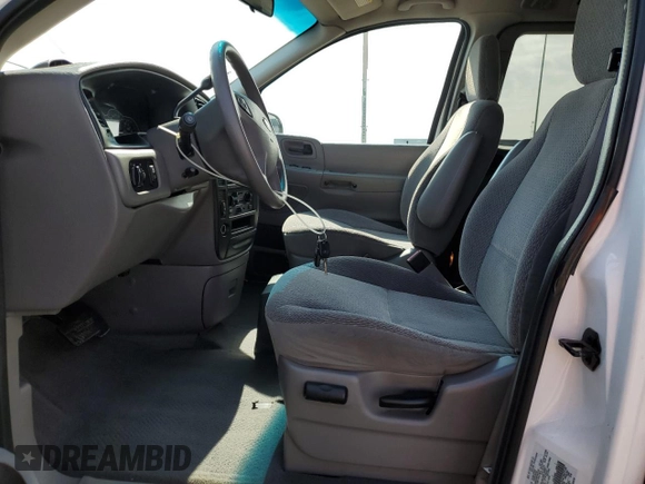 2001 Ford Windstar SEL with VIN 2FMDA56461BA55148, listed as a Copart auction lot 66531405 with 74,409 mi miles and Salvage title. Bid and sale history available at DreamBid. Image 7.