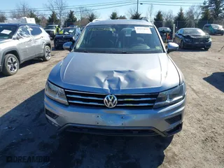 2020 Volkswagen Tiguan SE with VIN 3VV2B7AX0LM141970, listed as a IAAI auction lot 41633622 with 64,737 mi miles. Bid and sale history available at carsss.com. Image 12.