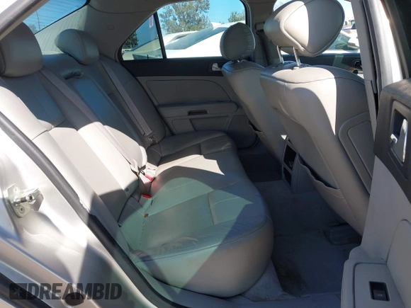 2005 Cadillac STS z VIN 1G6DW677350224198, wystawiony jako IAAI lot #42321639 z przebiegiem 122 208 mil mil oraz . Historia ofert i sprzedaży dostępna na DreamBid. Obrazek 8.