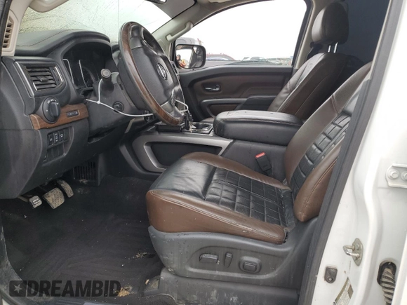 2017 Nissan Titan Platinum Reserve z VIN 1N6AA1E56HN542534, wystawiony jako Copart lot #44550645 z przebiegiem Nie podano mil oraz Szkoda całkowita • Salvage title. Historia ofert i sprzedaży dostępna na DreamBid. Obrazek 7.
