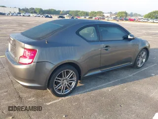 2012 Scion tC with VIN JTKJF5C74C3026945, listed as a IAAI auction lot 41757437 with 104,039 mi miles. Bid and sale history available at carsss.com. Image 4.