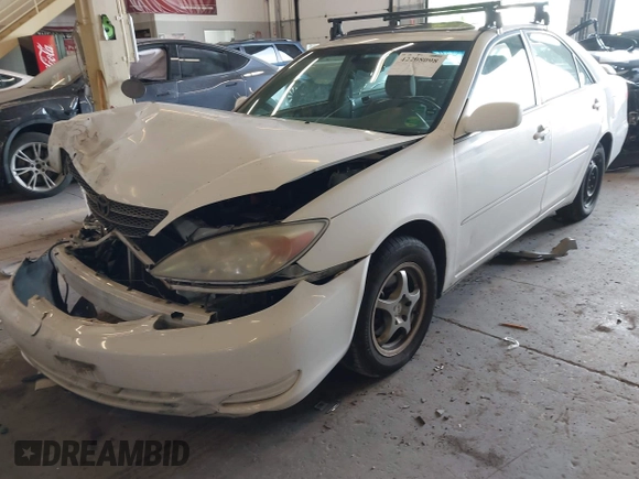 2004 Toyota Camry LE with VIN JTDBE32K540257588, listed as a IAAI auction lot 42208098 with 201,770 mi miles and . Bid and sale history available at DreamBid. Image 6.
