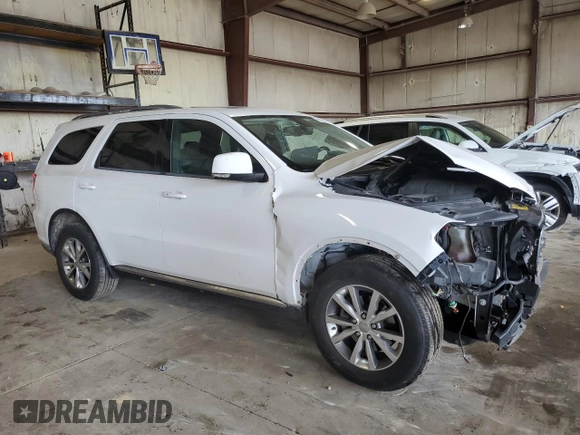 2014 Dodge Durango Limited z VIN 1C4RDJDG1EC593074, wystawiony jako Copart lot #64185525 z przebiegiem 125 203 mil mil oraz Szkoda całkowita • Salvage title. Historia ofert i sprzedaży dostępna na DreamBid. Obrazek 4.