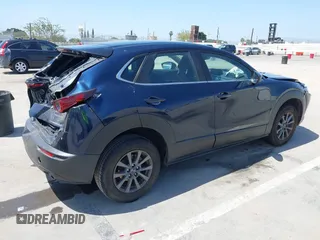 2021 Mazda CX-30 S with VIN 3MVDMAAL1MM270540, listed as a IAAI auction lot 42521513 with 63,993 mi miles and . Bid and sale history available at DreamBid. Image 4.