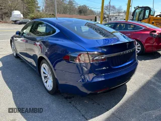 2016 Tesla Model S 90D with VIN 5YJSA1E29GF153669, listed as a Copart auction lot 63765555 with 87,476 mi miles and Clean title. Bid and sale history available at DreamBid. Image 3.