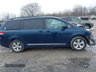 2011 Toyota Sienna LE AAS with VIN 5TDKK3DC4BS094456, listed as a IAAI auction lot 41956894 with 176,882 mi miles. Bid and sale history available at carsss.com. Image 13.