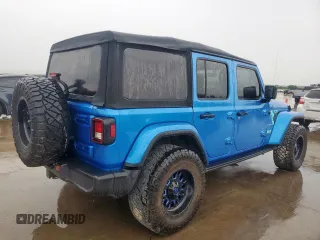 2023 Jeep Wrangler Sahara with VIN 1C4HJXEG7PW590252, listed as a Copart auction lot 59377765 with 32,689 mi miles and Salvage title. Bid and sale history available at DreamBid. Image 3.