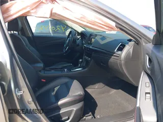 2015 Mazda 6 i Grand Touring with VIN JM1GJ1W52F1195333, listed as a IAAI auction lot 42014865 with 107,039 mi miles and . Bid and sale history available at DreamBid. Image 5.