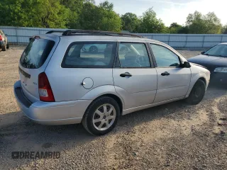 2005 Ford Focus SE with VIN 1FAFP36N55W155129, listed as a Copart auction lot 52940795 with 111,400 mi miles and Salvage Title. Bid and sale history available at carsss.com. Image 3.