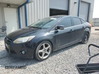 2014 Ford Focus Titanium with VIN 1FADP3J20EL347435, listed as a Copart auction lot 54947345 with 144,169 mi miles and Salvage title. Bid and sale history available at DreamBid. Image 1.