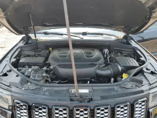 2017 Jeep Grand Cherokee Altitude with VIN 1C4RJFAG5HC892291, listed as a Copart auction lot 58579975 with 71,018 mi miles and Salvage title. Bid and sale history available at DreamBid. Image 12.