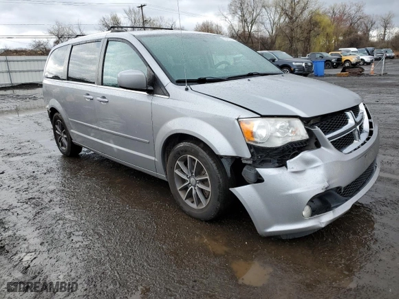 2017 Dodge Grand Caravan SXT with VIN 2C4RDGCG1HR624209, listed as a Copart auction lot 52095335 with 156,761 mi miles and Salvage Title. Bid and sale history available at carsss.com. Image 4.
