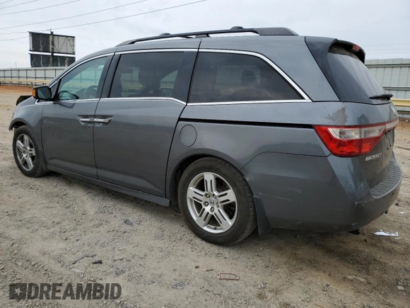 2012 Honda Odyssey Touring with VIN 5FNRL5H96CB045514, listed as a Copart auction lot 54698355 with 217,787 mi miles and Clean Title. Bid and sale history available at DreamBid. Image 2.