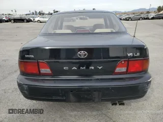 1995 Toyota Camry LE with VIN JT2GK12E2S0079545, listed as a Copart auction lot 84058164 with 150,539 mi miles and Salvage Title. Bid and sale history available at carsss.com. Image 6.