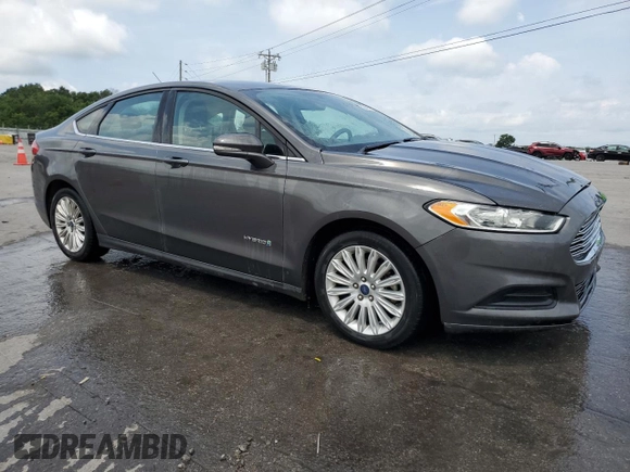 2016 Ford Fusion SE Hybrid с VIN 3FA6P0LU8GR227215, выставлен на аукционе Copart как лот 62669895 с пробегом 249 837 миль миль и Списание • Salvage title. История ставок и продаж доступна на DreamBid. Изображение 4.