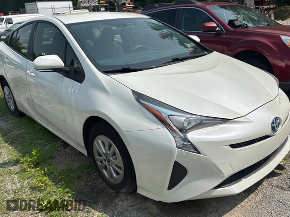 2016 Toyota Prius Two z VIN JTDKBRFU2G3510506, wystawiony jako Copart lot #60991615 z przebiegiem Nie podano mil oraz Czysty tytuł • Clean title. Historia ofert i sprzedaży dostępna na DreamBid. Obrazek 1.