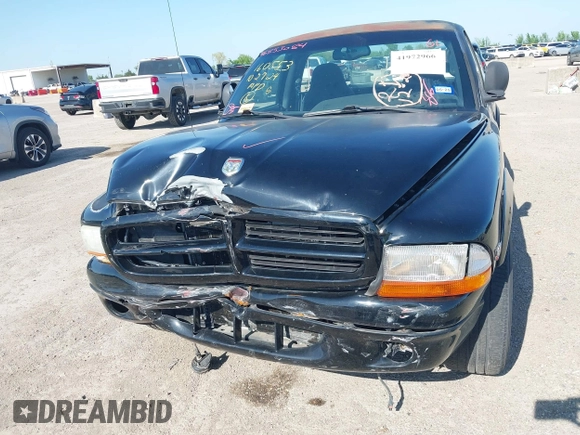 2000 Dodge Dakota SLT with VIN 1B7GL26ZXYS720333, listed as a IAAI auction lot 41972966 with 111,584 mi miles and . Bid and sale history available at DreamBid. Image 6.