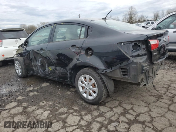 2013 Kia Rio LX with VIN KNADM4A30D6207753, listed as a Copart auction lot 85595694 with 63,062 mi miles and Salvage Title. Bid and sale history available at carsss.com. Image 2.