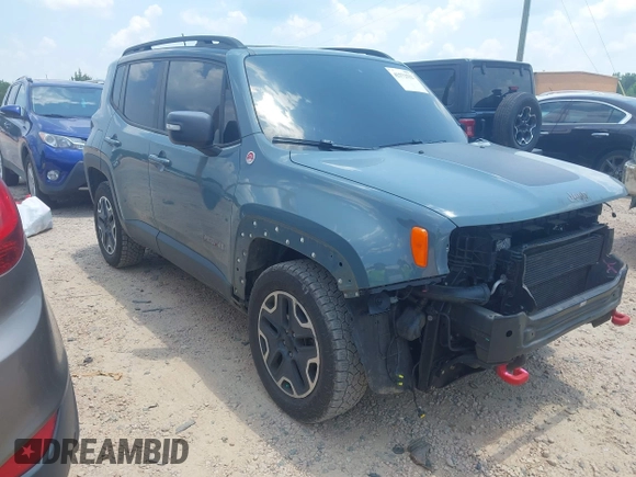 2016 Jeep Renegade Trailhawk with VIN ZACCJBCT1GPE10015, listed as a IAAI auction lot 42572522 with 131,631 mi miles and . Bid and sale history available at DreamBid. Image 1.