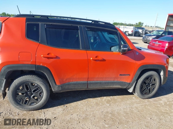 2018 Jeep Renegade Trailhawk z VIN ZACCJBCB6JPH44846, wystawiony jako IAAI lot #42320847 z przebiegiem 103 004 mil mil oraz . Historia ofert i sprzedaży dostępna na DreamBid. Obrazek 13.