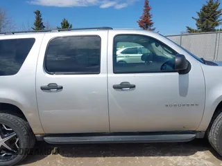 2010 Chevrolet Suburban LS with VIN 1GNUKHE34AR225345, listed as a IAAI auction lot 42106308 with 203,097 mi miles. Bid and sale history available at carsss.com. Image 14.