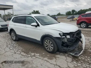 2020 Volkswagen Tiguan S with VIN 3VV1B7AXXLM100189, listed as a Copart auction lot 58539845 with 39,153 mi miles and Salvage title. Bid and sale history available at DreamBid. Image 4.