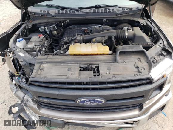 2018 Ford F-150 XL with VIN 1FTEW1CB3JFB73176, listed as a Copart auction lot 58741785 with 153,162 mi miles and Salvage title. Bid and sale history available at DreamBid. Image 11.