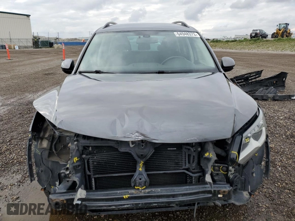 2017 Volkswagen Tiguan with VIN WVGHV7AX1HK017717, listed as a Copart auction lot 64948373 with 77,825 mi miles and Salvage title. Bid and sale history available at DreamBid. Image 5.