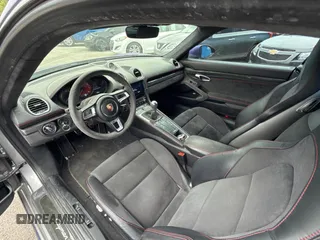 2018 Porsche 718 Cayman S with VIN WP0AB2A8XJK279655, listed as a Copart auction lot 55249845 with 59,283 mi miles and Clean Title. Bid and sale history available at DreamBid. Image 9.