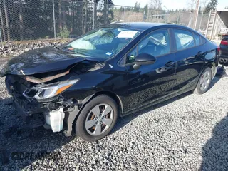 2017 Chevrolet Cruze LS z VIN 1G1BC5SM5H7277073, wystawiony jako IAAI lot #41336306 z przebiegiem 95 515 mil mil oraz . Historia ofert i sprzedaży dostępna na DreamBid. Obrazek 18.