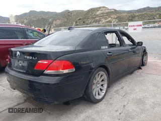 2006 BMW 7 Series 750Li with VIN WBAHN83556DT35408, listed as a IAAI auction lot 42055618 with Not Provided miles and . Bid and sale history available at carsss.com. Image 4.